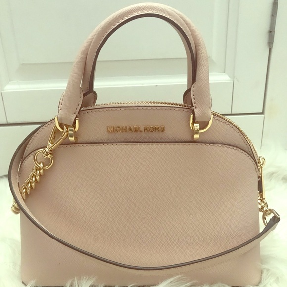 Michael Kors Handbags - ❌SOLD❌ Micheal Kors pale pink small dome purse